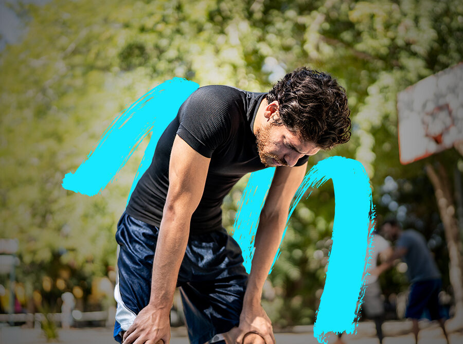man in athletic shorts recovering from exercise